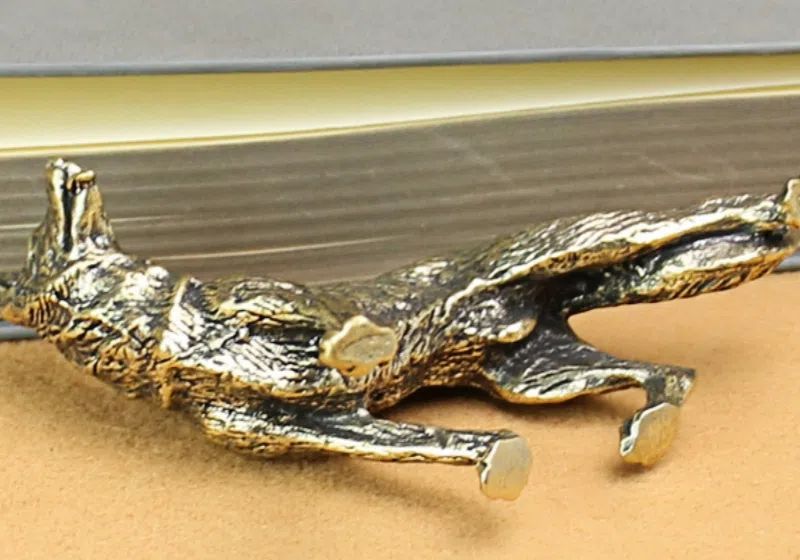 Antique brass dog